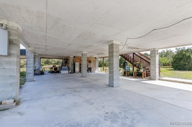 view of patio / terrace featuring stairs