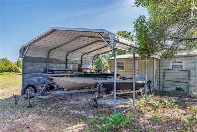 view of vehicle parking with a carport