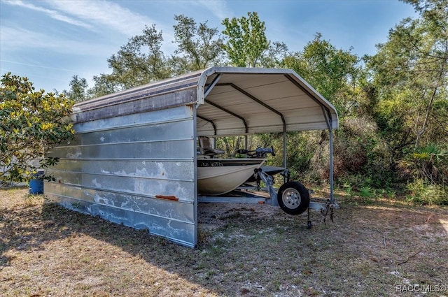 exterior space with a carport