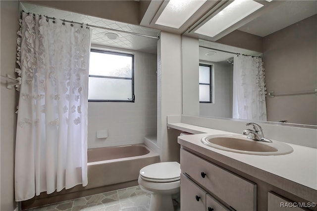 full bathroom with vanity, tile patterned flooring, shower / bathtub combination with curtain, and toilet