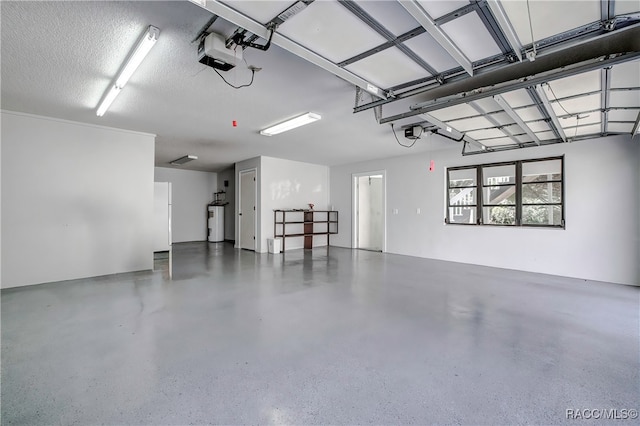 garage with electric water heater and a garage door opener