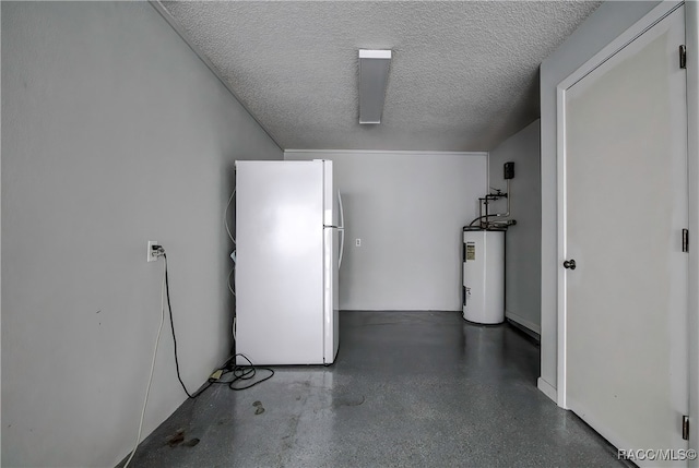 garage featuring electric water heater and white refrigerator