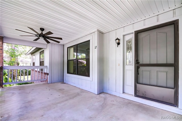 property entrance featuring a porch and ceiling fan