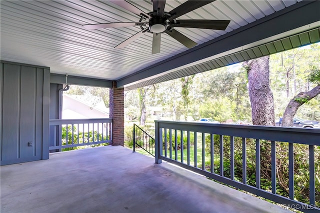 exterior space with ceiling fan