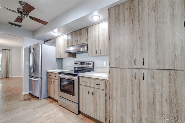 kitchen featuring ceiling fan, light brown cabinetry, light hardwood / wood-style floors, and appliances with stainless steel finishes