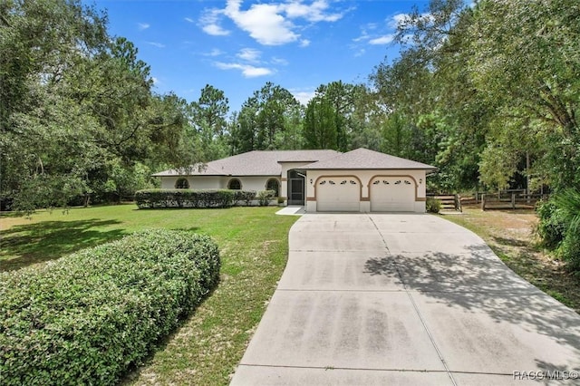 2494 W Axelwood Dr, Beverly Hills, FL 34465 - single story home with a garage, stucco siding, driveway, and a front yard