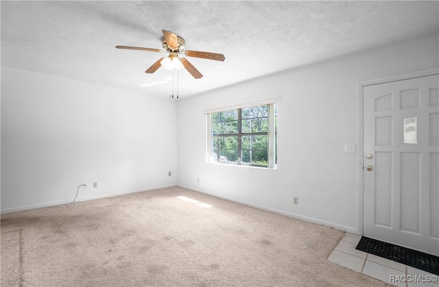 728 S Juniper Way, Inverness, FL 34450 - carpeted entryway featuring a ceiling fan and baseboards
