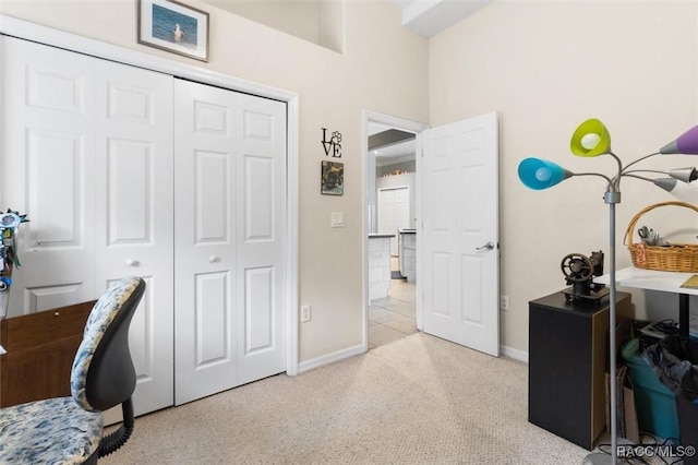 office area with baseboards and light colored carpet