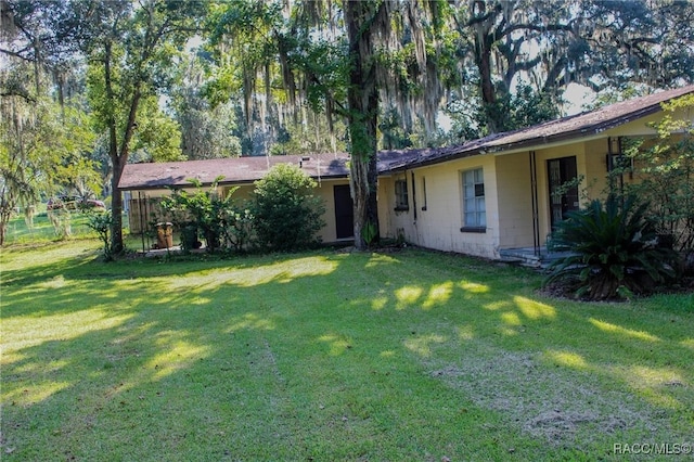 exterior space featuring a front lawn