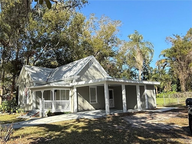 farmhouse inspired home featuring a porch