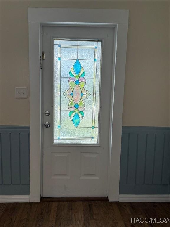 doorway featuring dark hardwood / wood-style floors