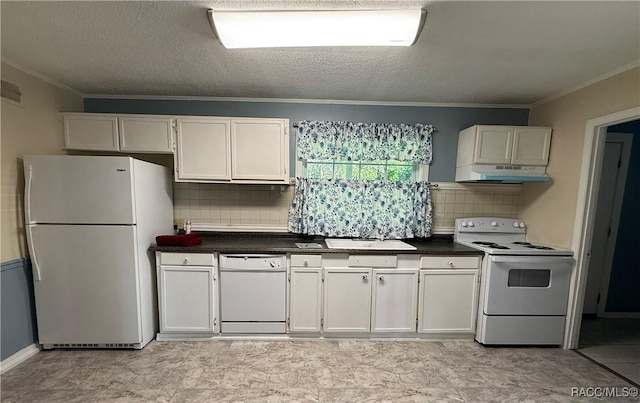 kitchen featuring white cabinets, white appliances, sink, and tasteful backsplash