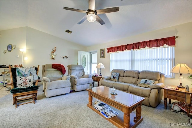 2191 S Moonlit Pt, Homosassa, FL 34448 - living area with a ceiling fan, vaulted ceiling, and carpet flooring