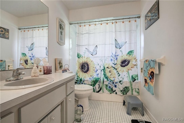 2191 S Moonlit Pt, Homosassa, FL 34448 - full bathroom featuring a shower with curtain, vanity, toilet, and tile patterned flooring