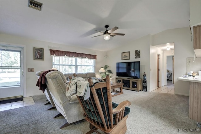 2191 S Moonlit Pt, Homosassa, FL 34448 - living room featuring a ceiling fan, light carpet, healthy amount of natural light, and lofted ceiling