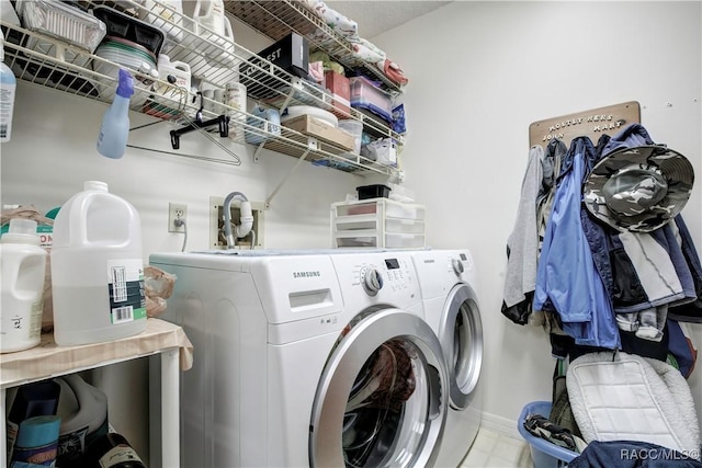 2191 S Moonlit Pt, Homosassa, FL 34448 - laundry area featuring independent washer and dryer and baseboards