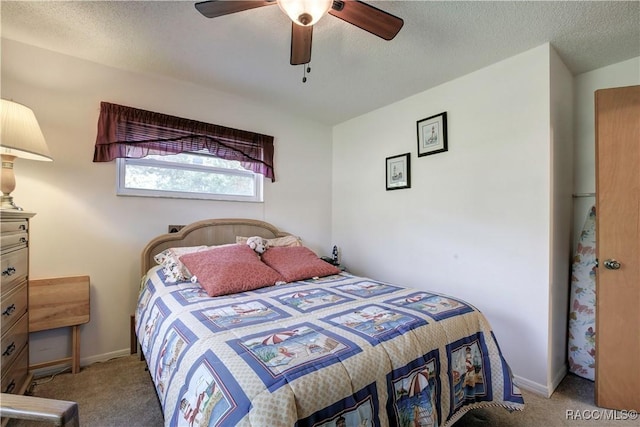 2191 S Moonlit Pt, Homosassa, FL 34448 - bedroom with carpet, baseboards, a ceiling fan, and a textured ceiling