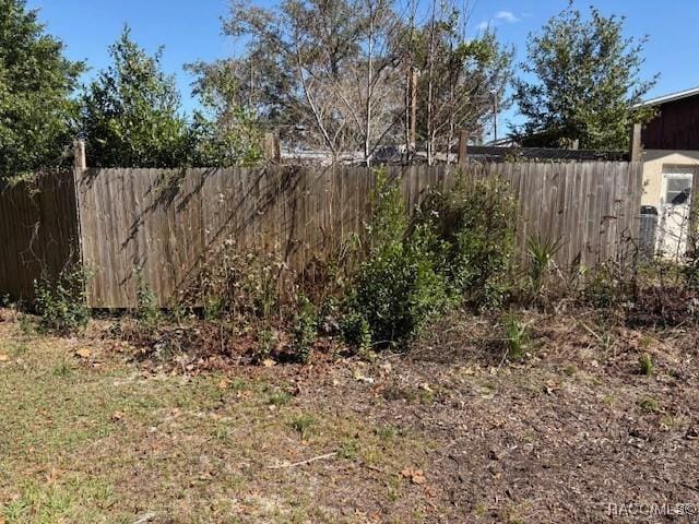 view of yard featuring fence