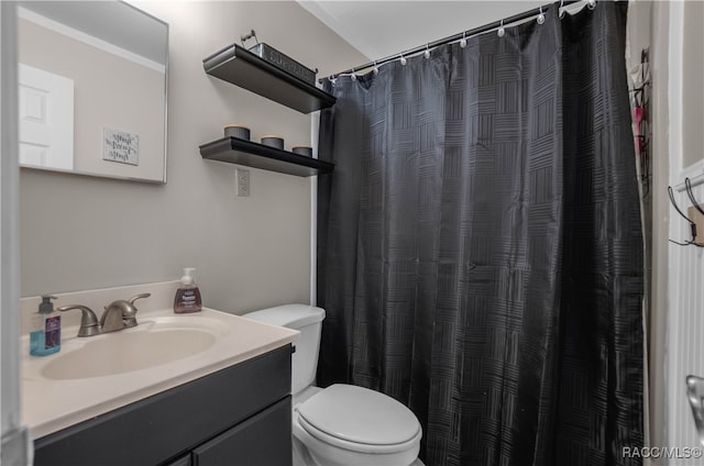 bathroom featuring vanity, toilet, and walk in shower