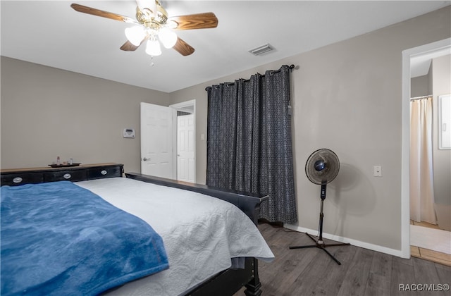 bedroom featuring ceiling fan and wood-type flooring