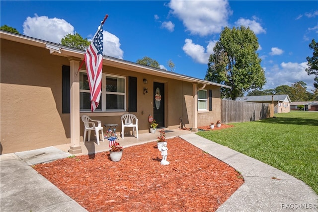 view of front of home with a front yard