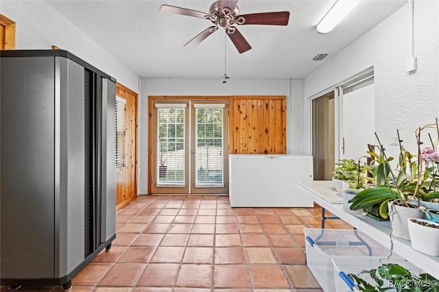 interior space featuring visible vents and french doors