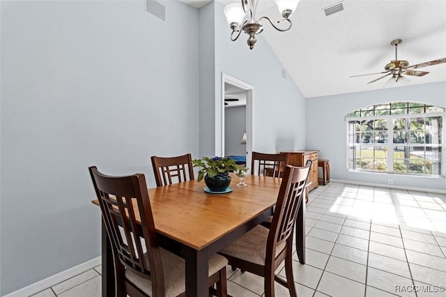 dining room with visible vents, vaulted ceiling, light tile patterned floors, baseboards, and ceiling fan with notable chandelier