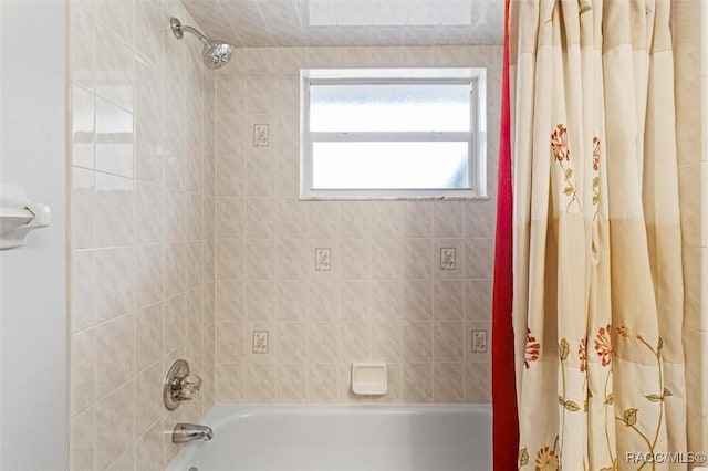 full bath featuring shower / bath combo with shower curtain