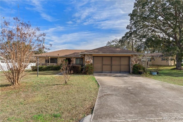 ranch-style home with a front yard and a garage