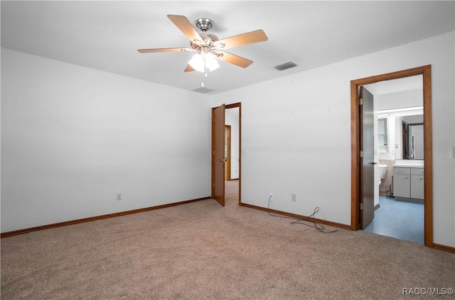 carpeted empty room with ceiling fan