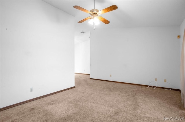 unfurnished room with light carpet and ceiling fan