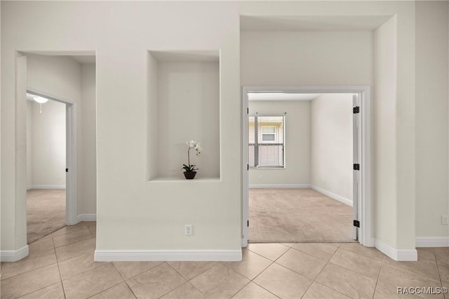 1825 W Caroline Path, Lecanto, FL 34461 - spare room featuring light colored carpet and light tile patterned flooring