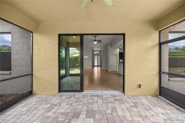 1825 W Caroline Path, Lecanto, FL 34461 - unfurnished sunroom with a ceiling fan and healthy amount of natural light