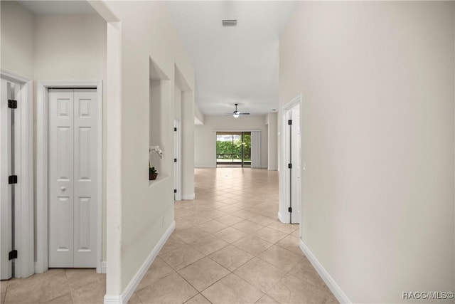 1825 W Caroline Path, Lecanto, FL 34461 - corridor with light tile patterned floors and baseboards
