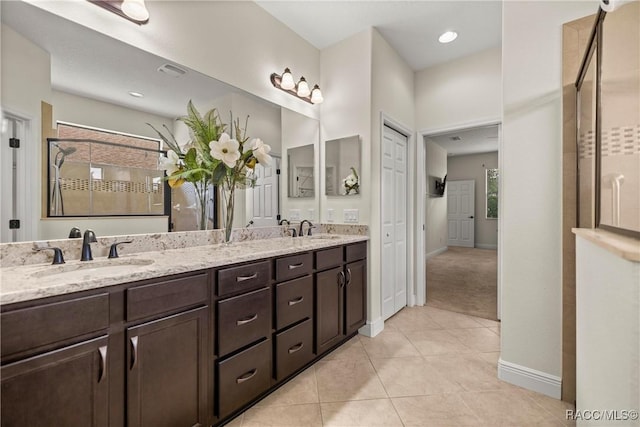 1825 W Caroline Path, Lecanto, FL 34461 - bathroom featuring double vanity, a shower with shower door, and tile patterned flooring