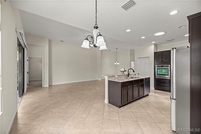 1825 W Caroline Path, Lecanto, FL 34461 - kitchen featuring a chandelier, appliances with stainless steel finishes, open floor plan, recessed lighting, and a kitchen island with sink