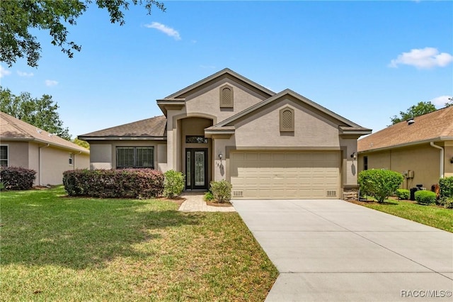1825 W Caroline Path, Lecanto, FL 34461 - ranch-style house with stucco siding, concrete driveway, a front yard, and a garage