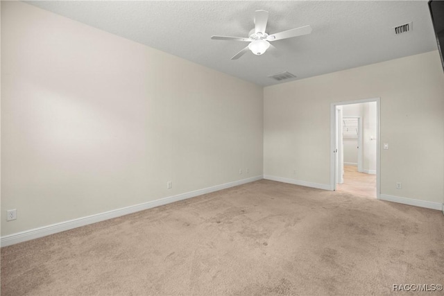 1825 W Caroline Path, Lecanto, FL 34461 - unfurnished room with light colored carpet and a ceiling fan