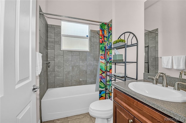 full bath featuring toilet, tile patterned flooring, shower / bath combination with curtain, and vanity