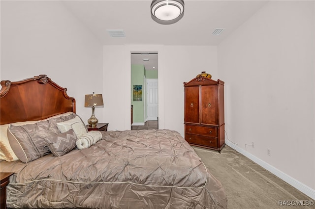 bedroom with light carpet