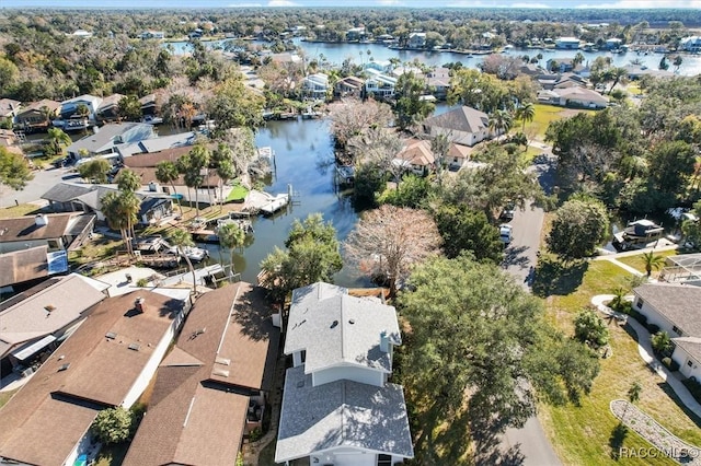 drone / aerial view with a water view