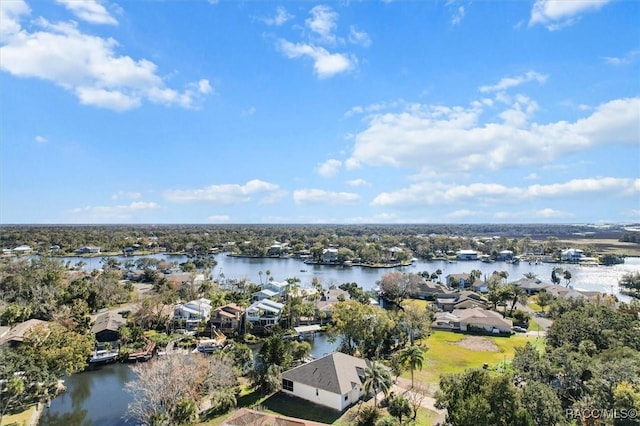 drone / aerial view with a water view