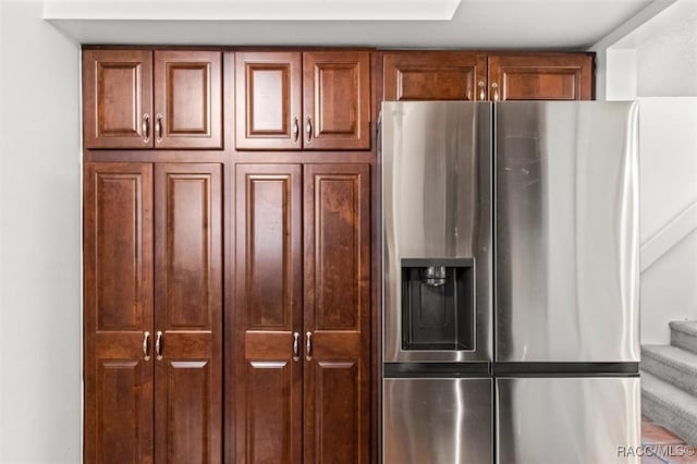 kitchen featuring stainless steel fridge