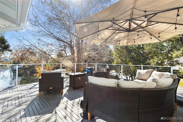 deck featuring an outdoor living space