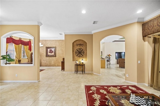 hallway featuring light tile patterned floors and crown molding