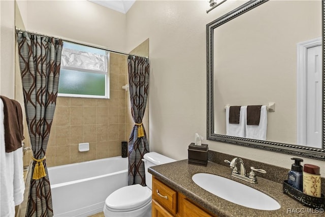 full bathroom featuring toilet, vanity, and shower / bathtub combination with curtain