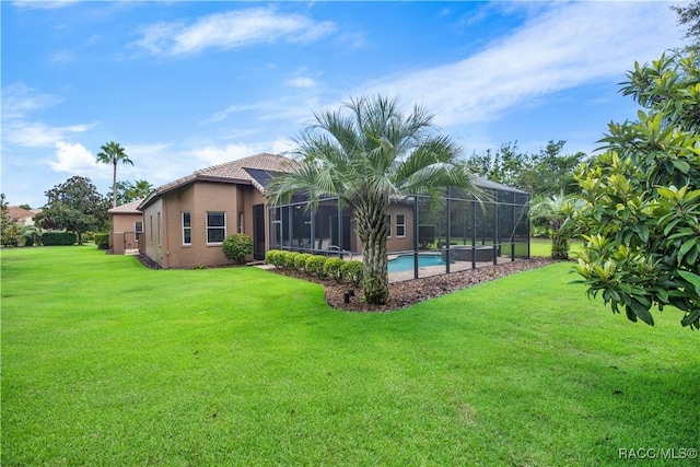 view of yard with a lanai