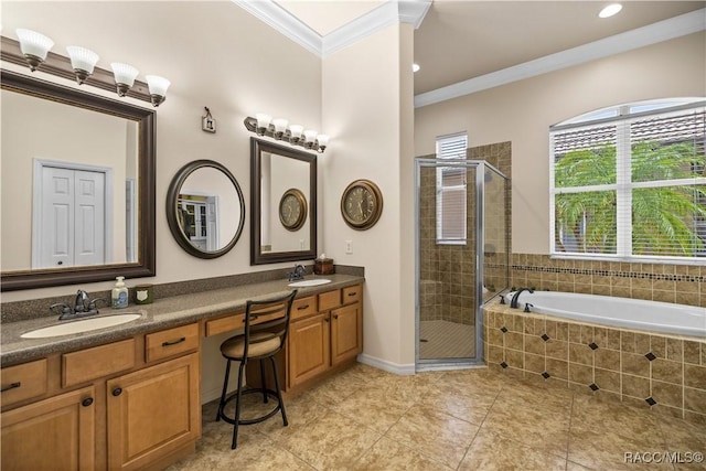 bathroom with crown molding, tile patterned floors, separate shower and tub, and vanity