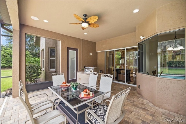 view of patio / terrace featuring ceiling fan