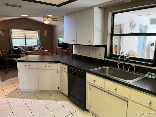 kitchen featuring vaulted ceiling, ceiling fan, sink, dishwasher, and light tile patterned flooring